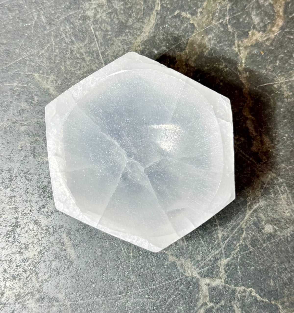 Top view of a white selenite hexagon bowl