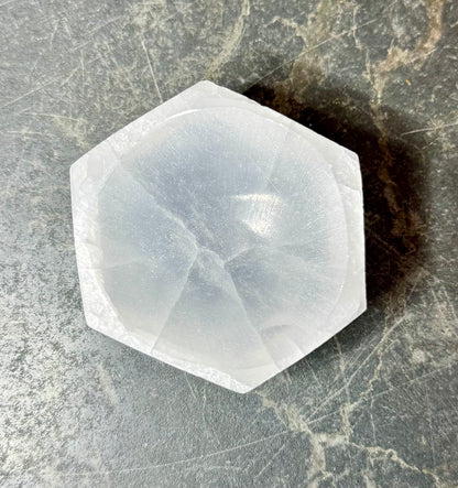 Top view of a white selenite hexagon bowl