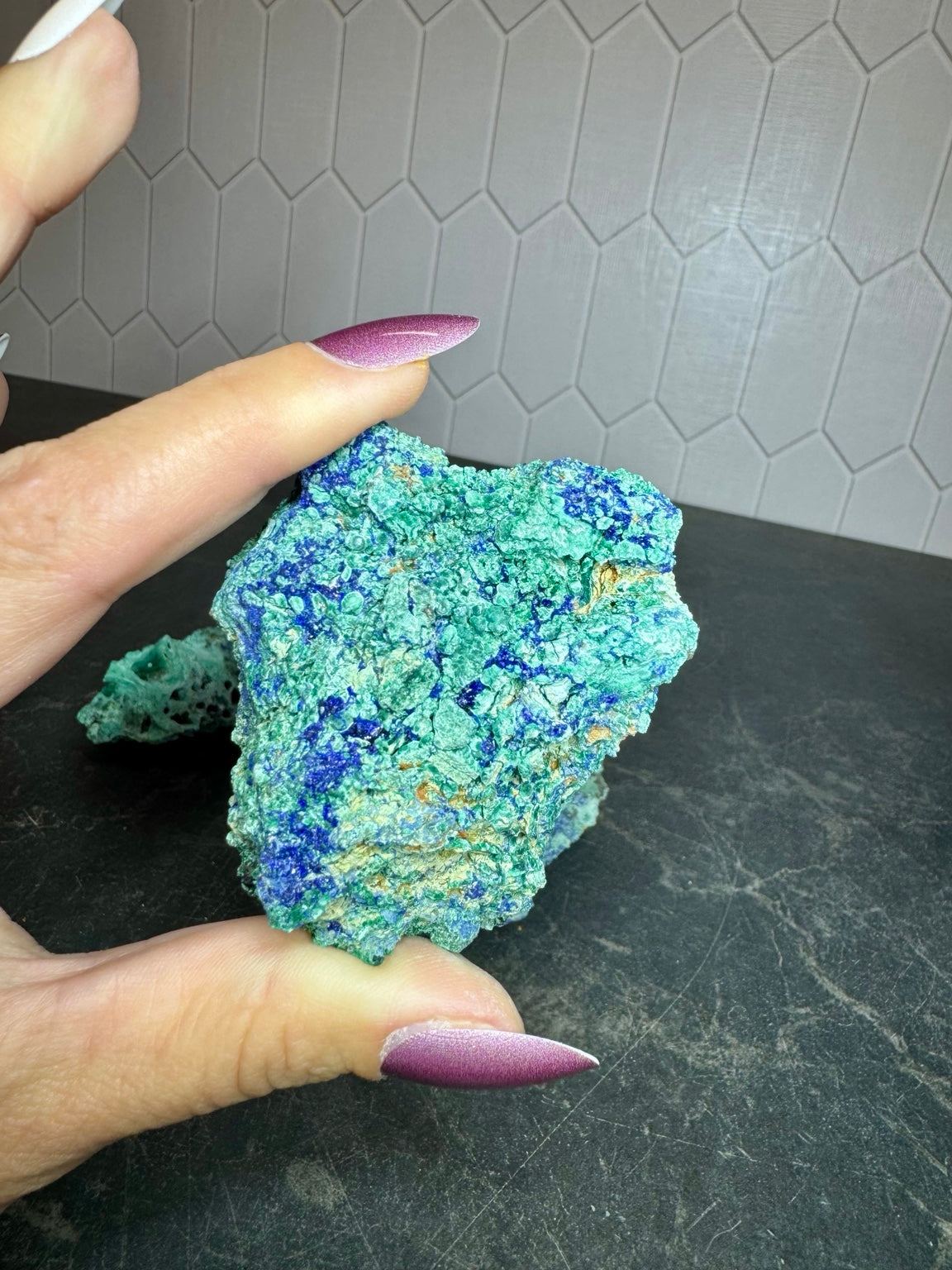 Azurite and malachite specimen shown for scale